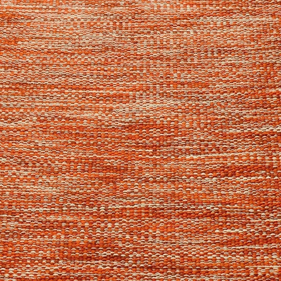 Gros plan du tissage de coton d’un tapis Terracotta